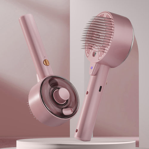 Steam self-cleaning pet hair brush